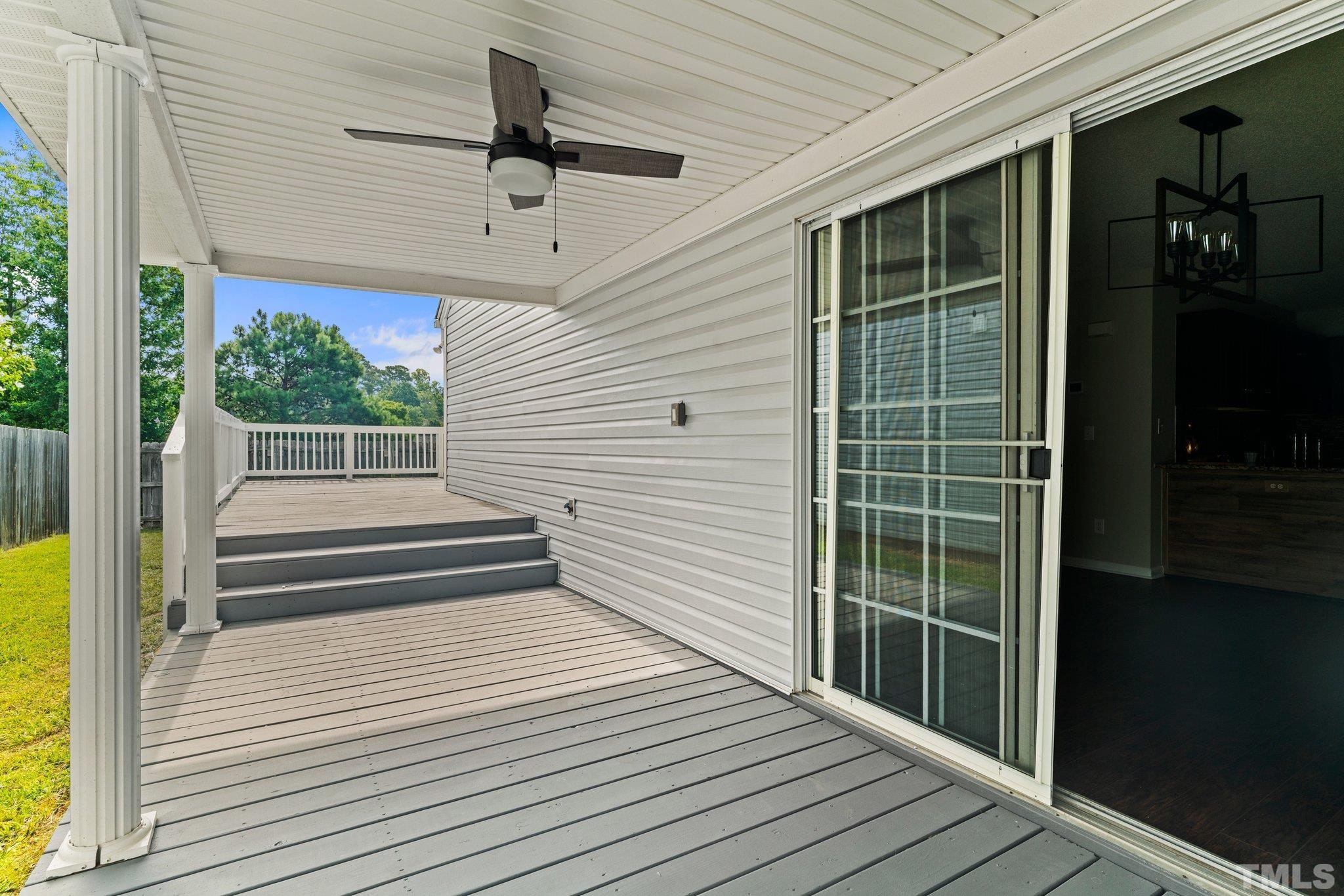 9136 Colony Village Lane Raleigh, NC 27617 - Photo 14 of 17 a view of a balcony with wooden floor