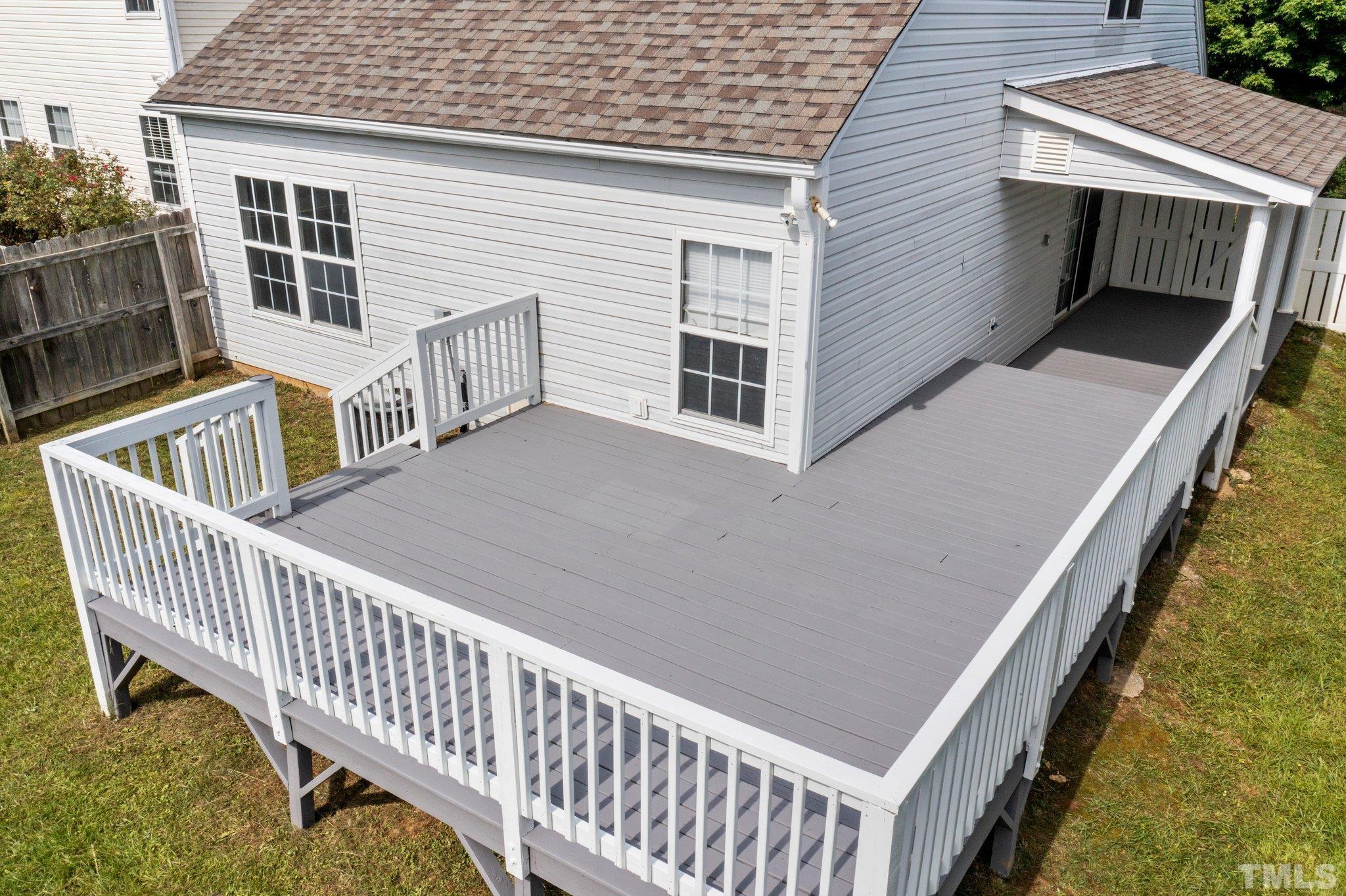 9136 Colony Village Lane Raleigh, NC 27617 - Photo 16 of 17 a view of balcony with deck and stairs