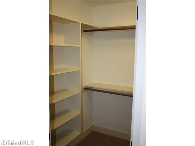 8906 West Pepper Court Oak Ridge, NC 27310 - Photo 9 of 16 Storage. There are 4 large walk-in closets found in this home. All closets have thoughtful details and solid shelving. There are also two walk-in storage areas, in addition to the oversized garage.