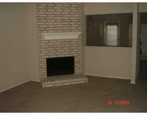a living room with a fireplace
