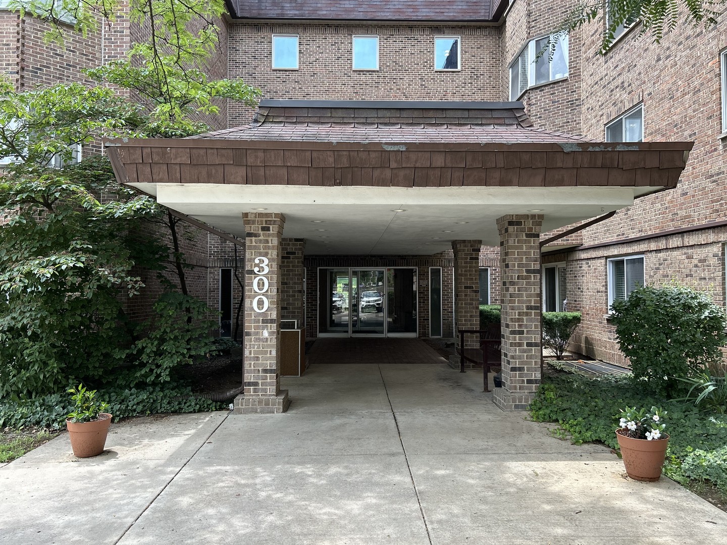 300 South Roselle Road, Unit 207 Schaumburg, IL 60193 - Photo 2 of 13 a view of a porch with seating space
