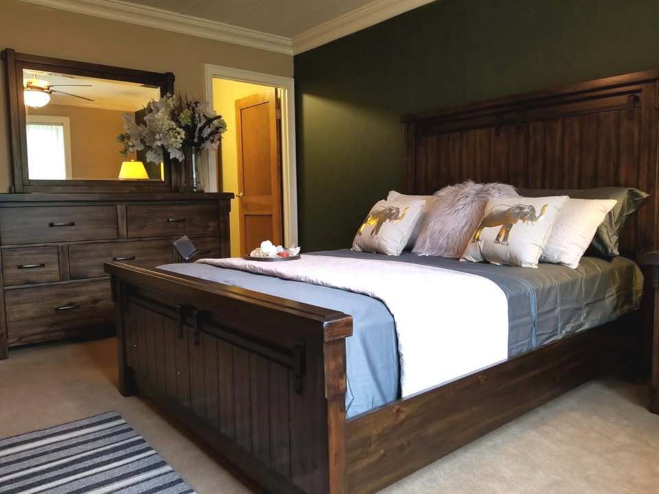 300 South Roselle Road, Unit 207 Schaumburg, IL 60193 - Photo 10 of 13 a bedroom with a bed and a dresser