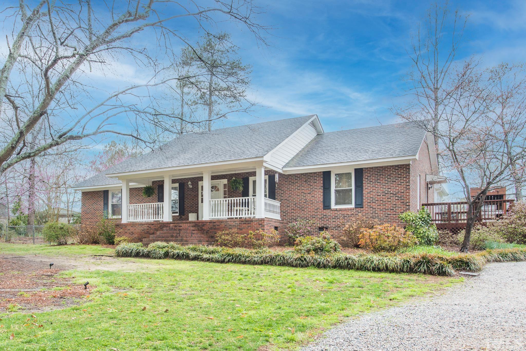 3021 Peebles Road Raleigh, NC 27616 - Photo 2 of 45 a front view of a house with garden
