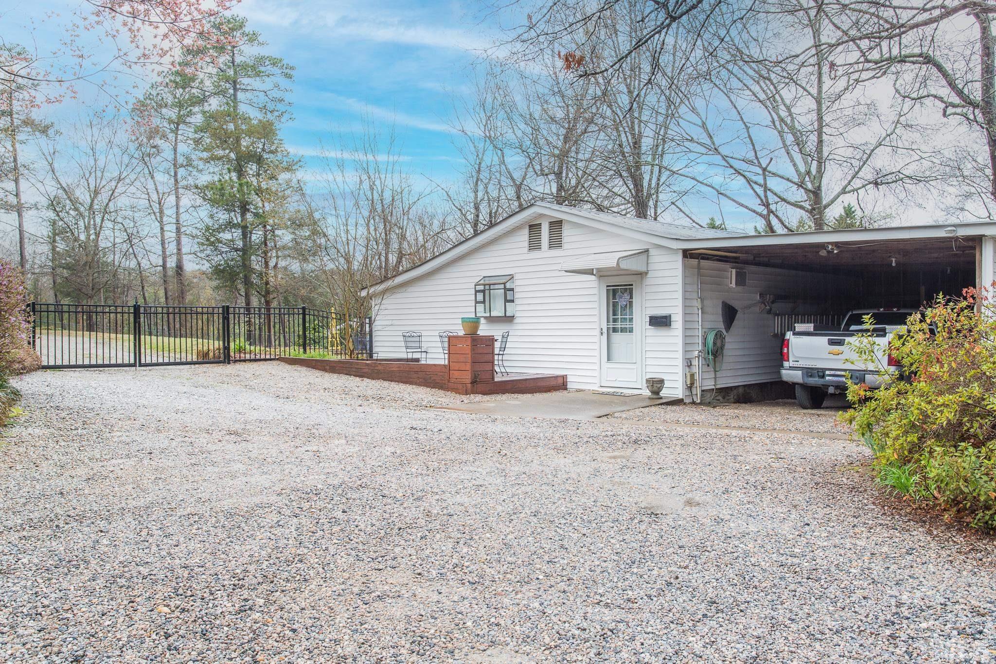 3021 Peebles Road Raleigh, NC 27616 - Photo 36 of 45 a view of a house with a yard and garage