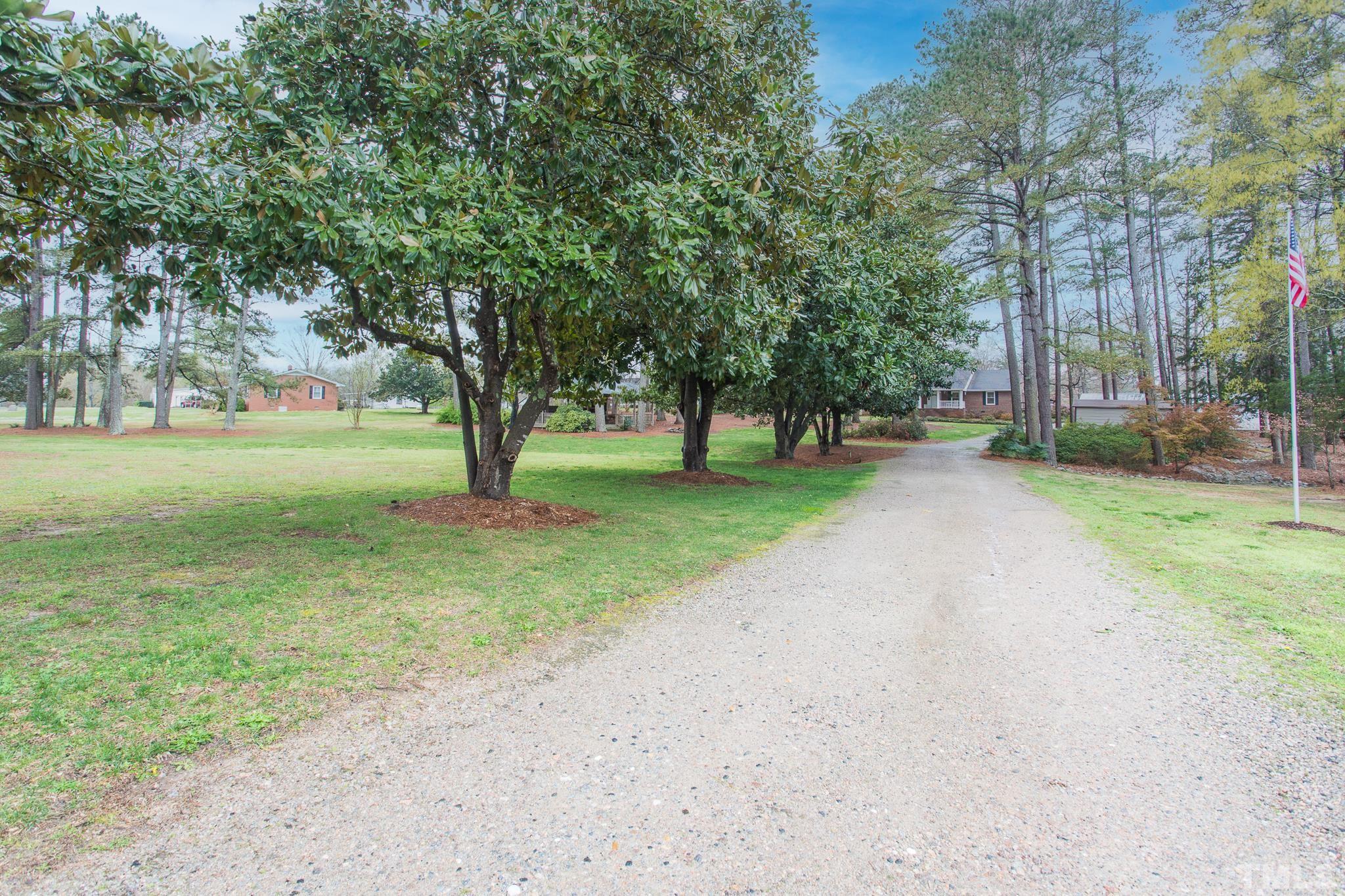 3021 Peebles Road Raleigh, NC 27616 - Photo 44 of 45 a view of a park with large trees