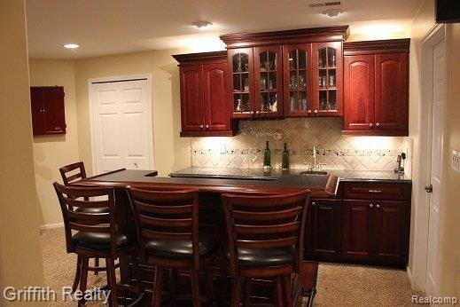 2976 Hunter Road Brighton, MI 48114 - Photo 9 of 20 basement bar area.jpg