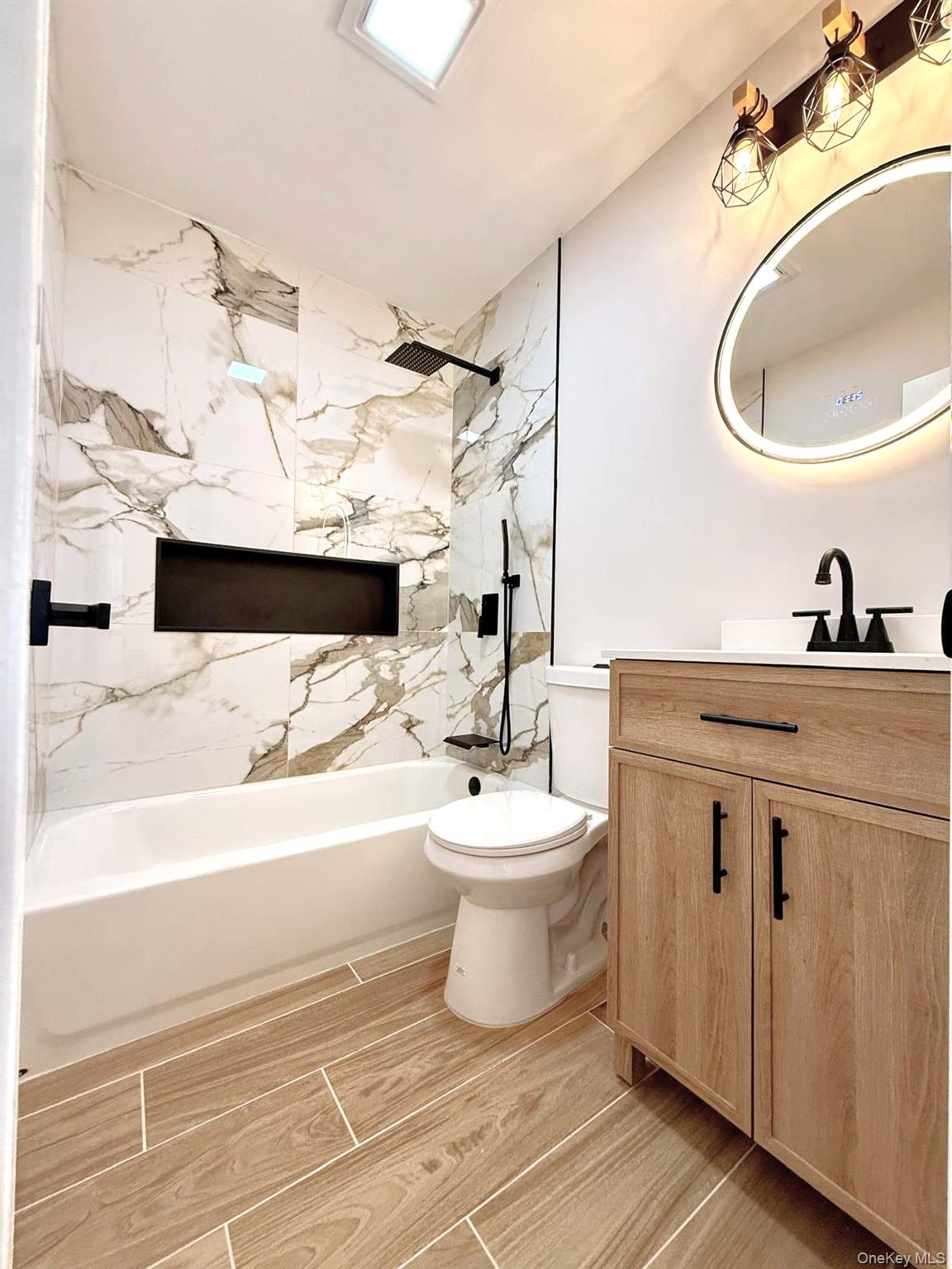 53 West Yaphank Road Medford, NY 11763 - Photo 19 of 24 a bathroom with a sink and a mirror