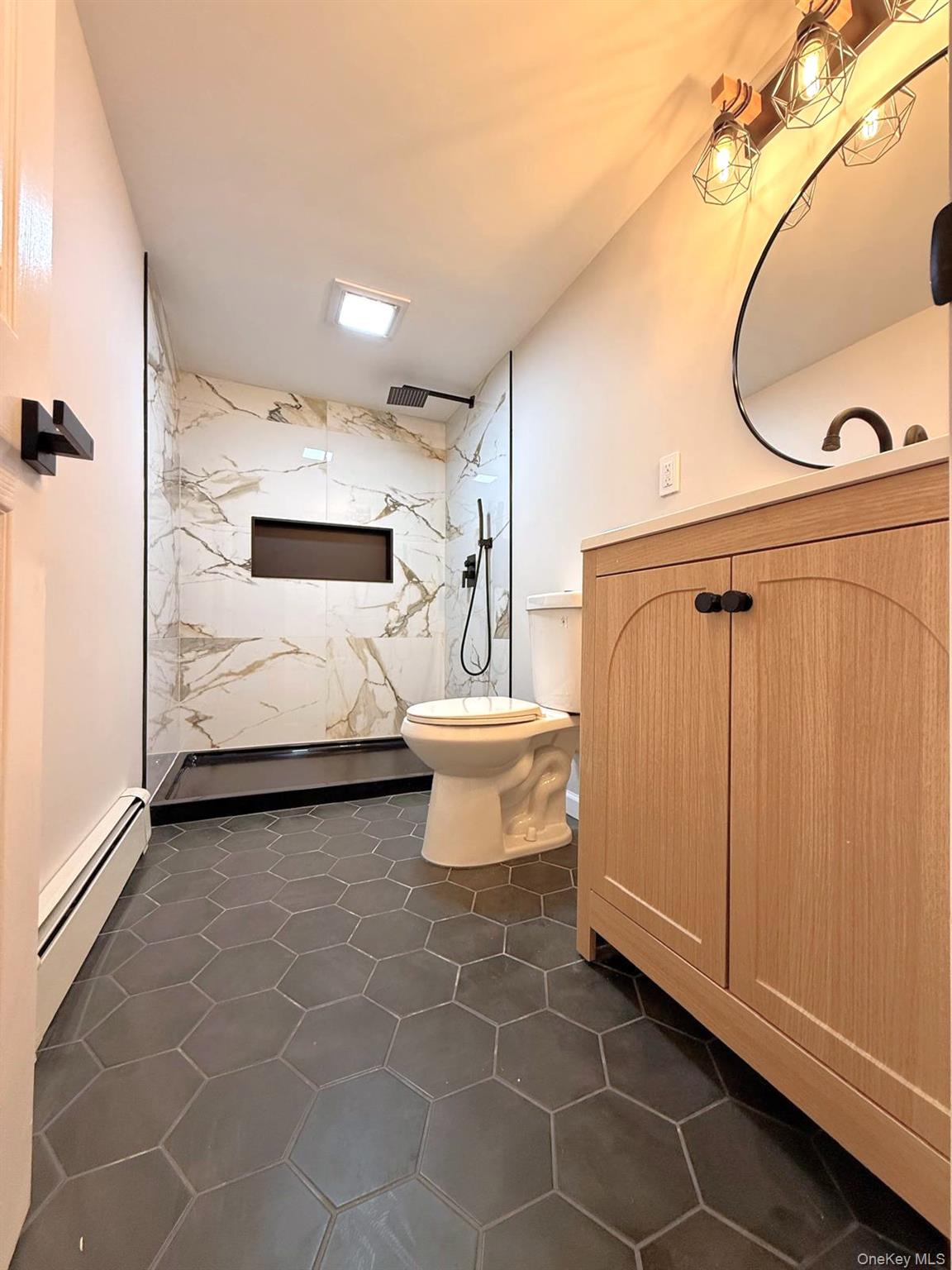 53 West Yaphank Road Medford, NY 11763 - Photo 20 of 24 a bathroom with a sink a toilet and shower