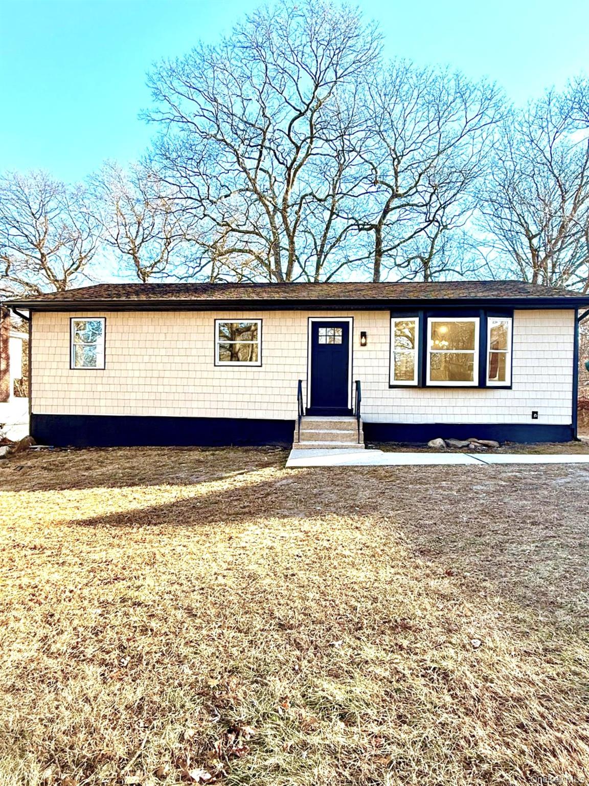53 West Yaphank Road Medford, NY 11763 - Photo 2 of 24 front view of a house with a yard