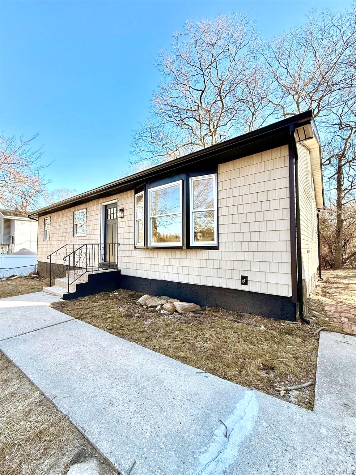 53 West Yaphank Road Medford, NY 11763 - Photo 22 of 24 a view of a house with a yard