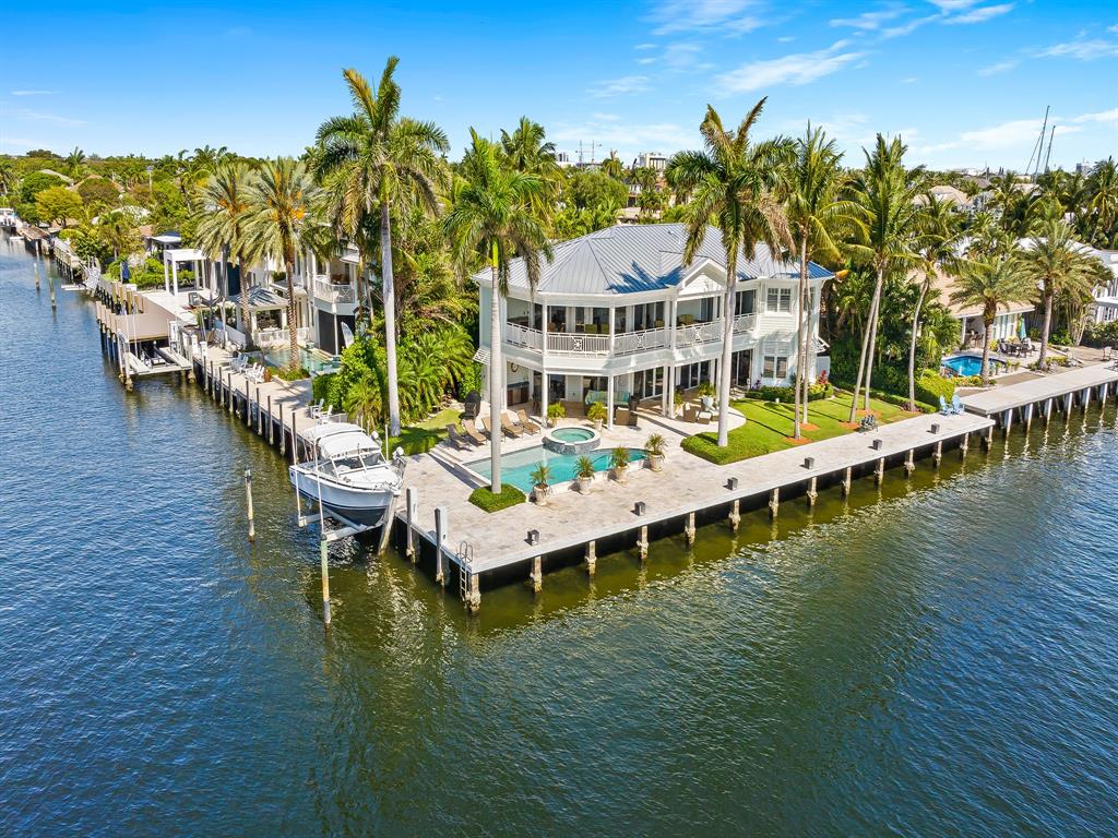 2898 Northeast 26th Street Fort Lauderdale, FL 33305 - Photo 23 of 77 a view of a lake with chairs