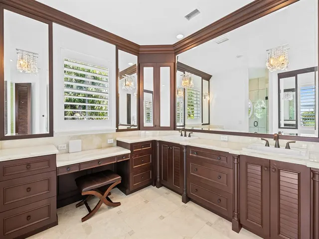 a view of a pathway with flower plants