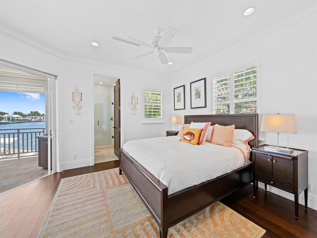 2898 Northeast 26th Street Fort Lauderdale, FL 33305 - Photo 49 of 77 a bed room with a bed and a chair