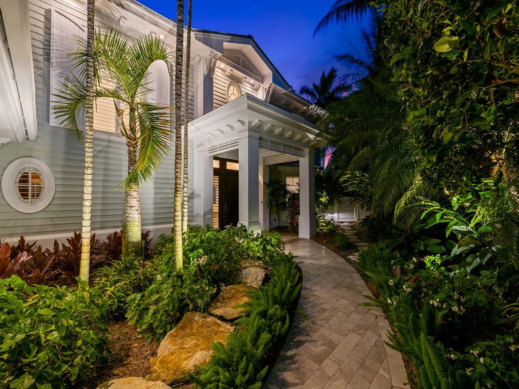2898 Northeast 26th Street Fort Lauderdale, FL 33305 - Photo 69 of 77 a view of a pathway with flower plants