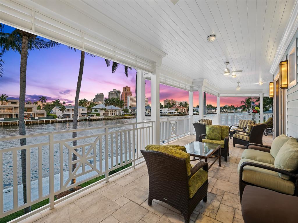 2898 Northeast 26th Street Fort Lauderdale, FL 33305 - Photo 73 of 77 a view of a chairs and table in a balcony