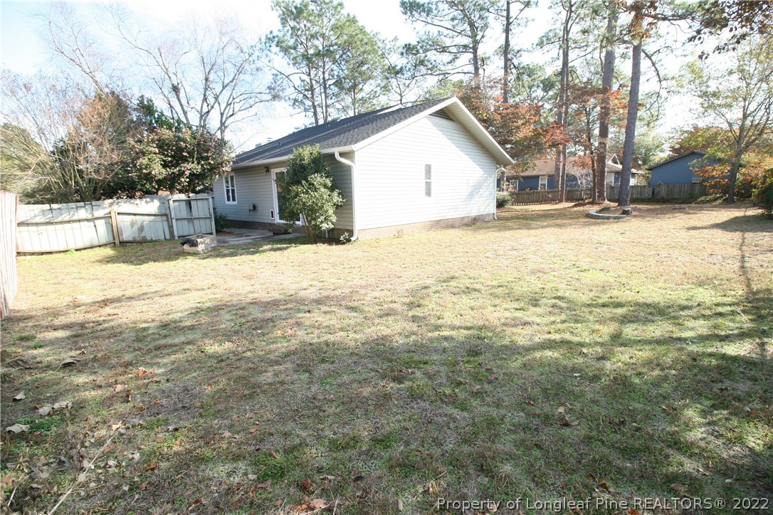 6241 Stoney Point Loop Fayetteville, NC 28306 - Photo 37 of 40 a view of house with yard