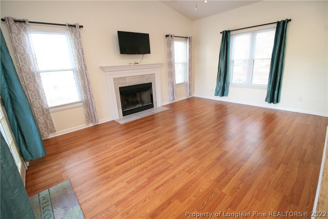 6241 Stoney Point Loop Fayetteville, NC 28306 - Photo 10 of 40 a view of a livingroom with a fireplace