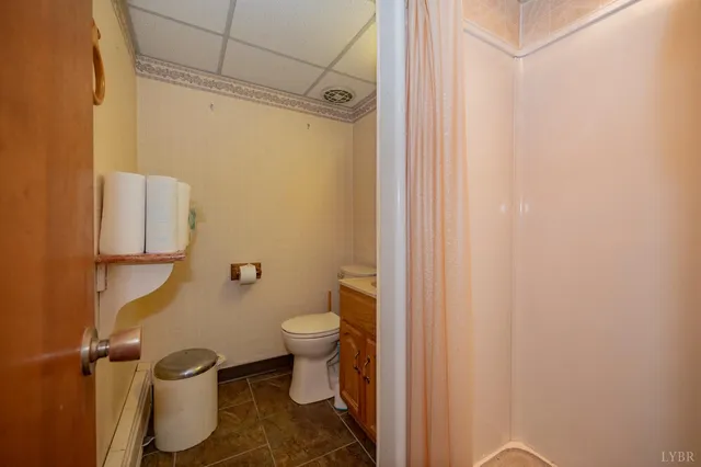 an empty room with a windows