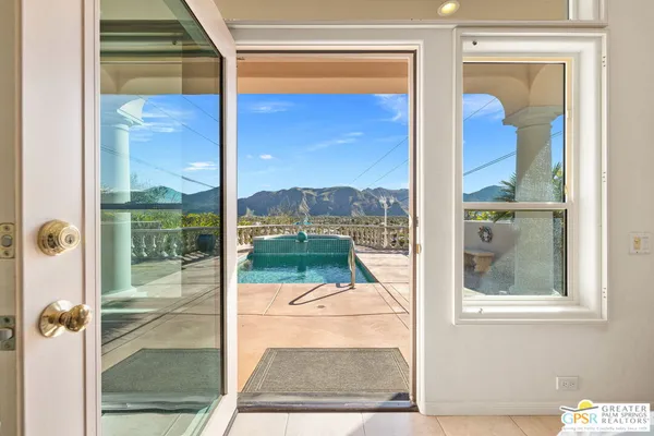 view of living room with a floor to ceiling window