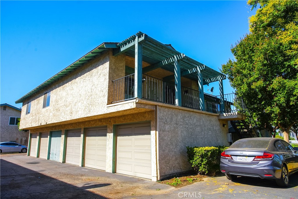 2321 Gonzaga Lane Riverside, CA 92507 - Photo 22 of 24 a car parked in front of a house