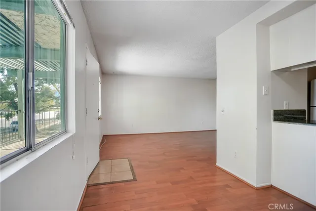 a view of hallway with a large window