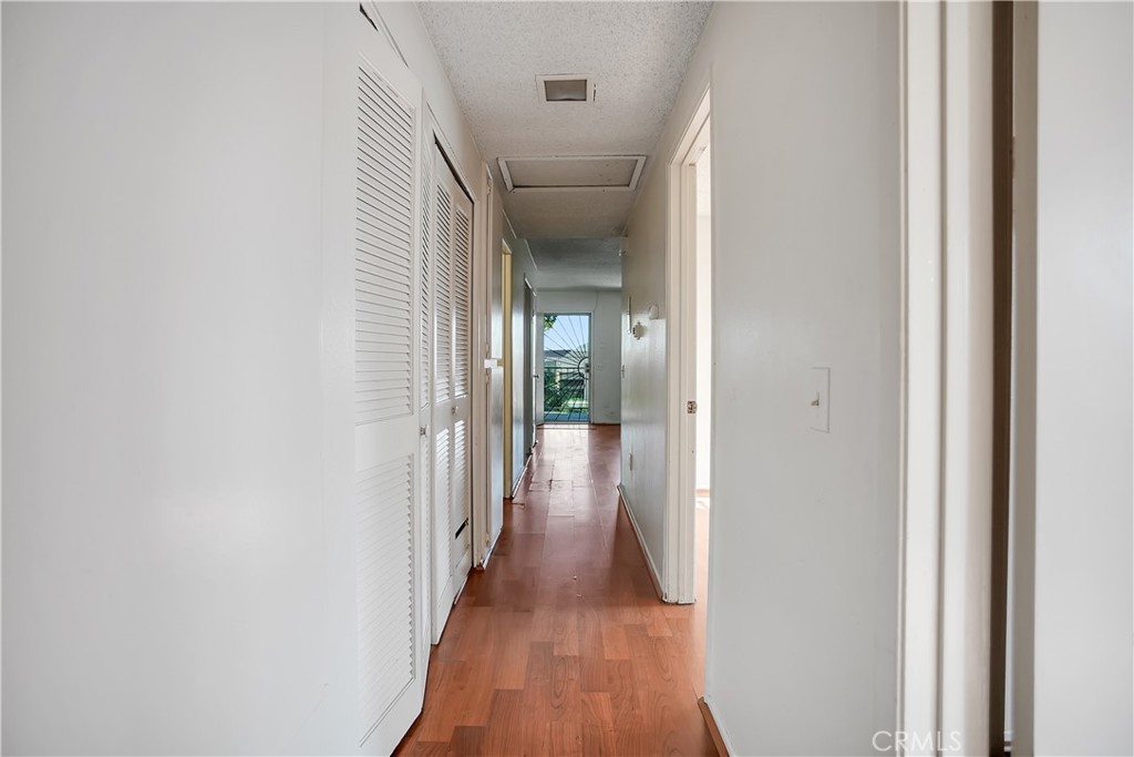 2321 Gonzaga Lane Riverside, CA 92507 - Photo 10 of 24 a view of a hallway with wooden floor