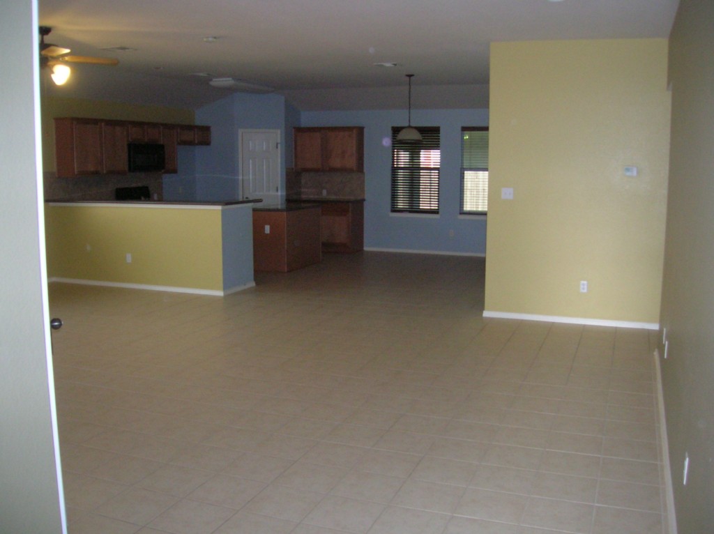 9504 Castle Pines Drive Austin, TX 78717 - Photo 5 of 12 view of a kitchen with a refrigerator and a sink