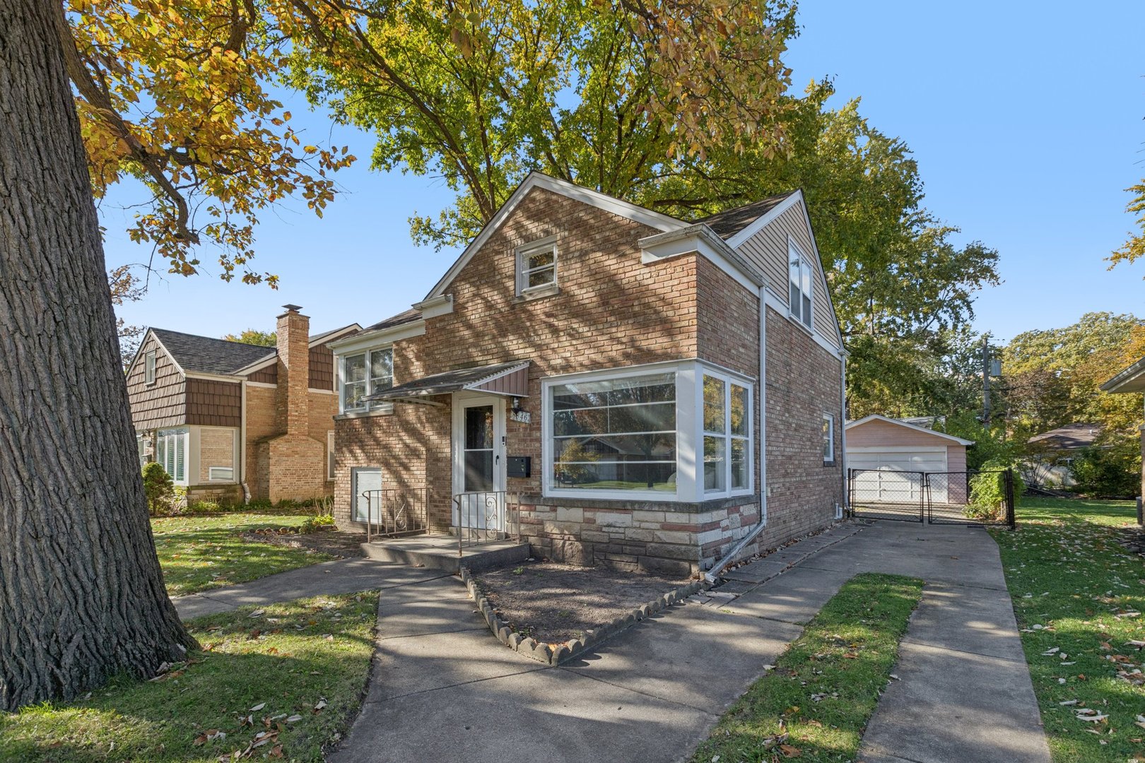 8846 Austin Avenue Morton Grove, IL 60053 - Photo 2 of 35 a view of a house with a yard