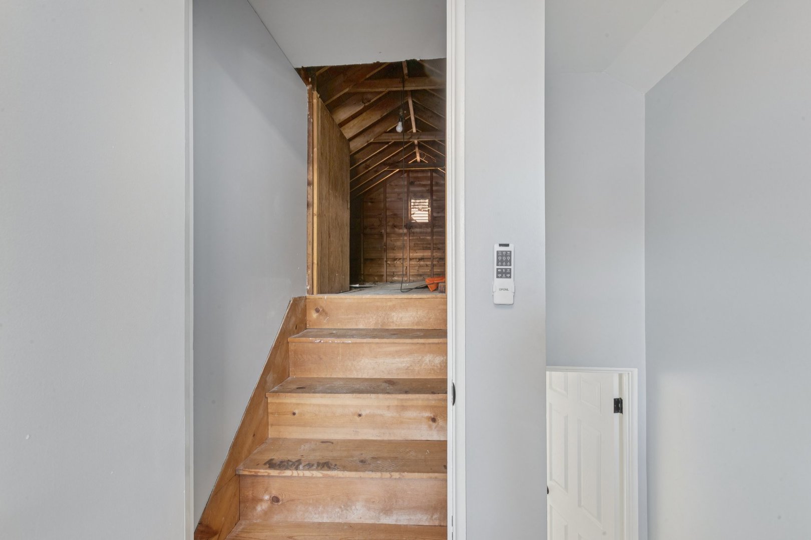 8846 Austin Avenue Morton Grove, IL 60053 - Photo 22 of 35 a view of a hallway with wooden floor and a large window