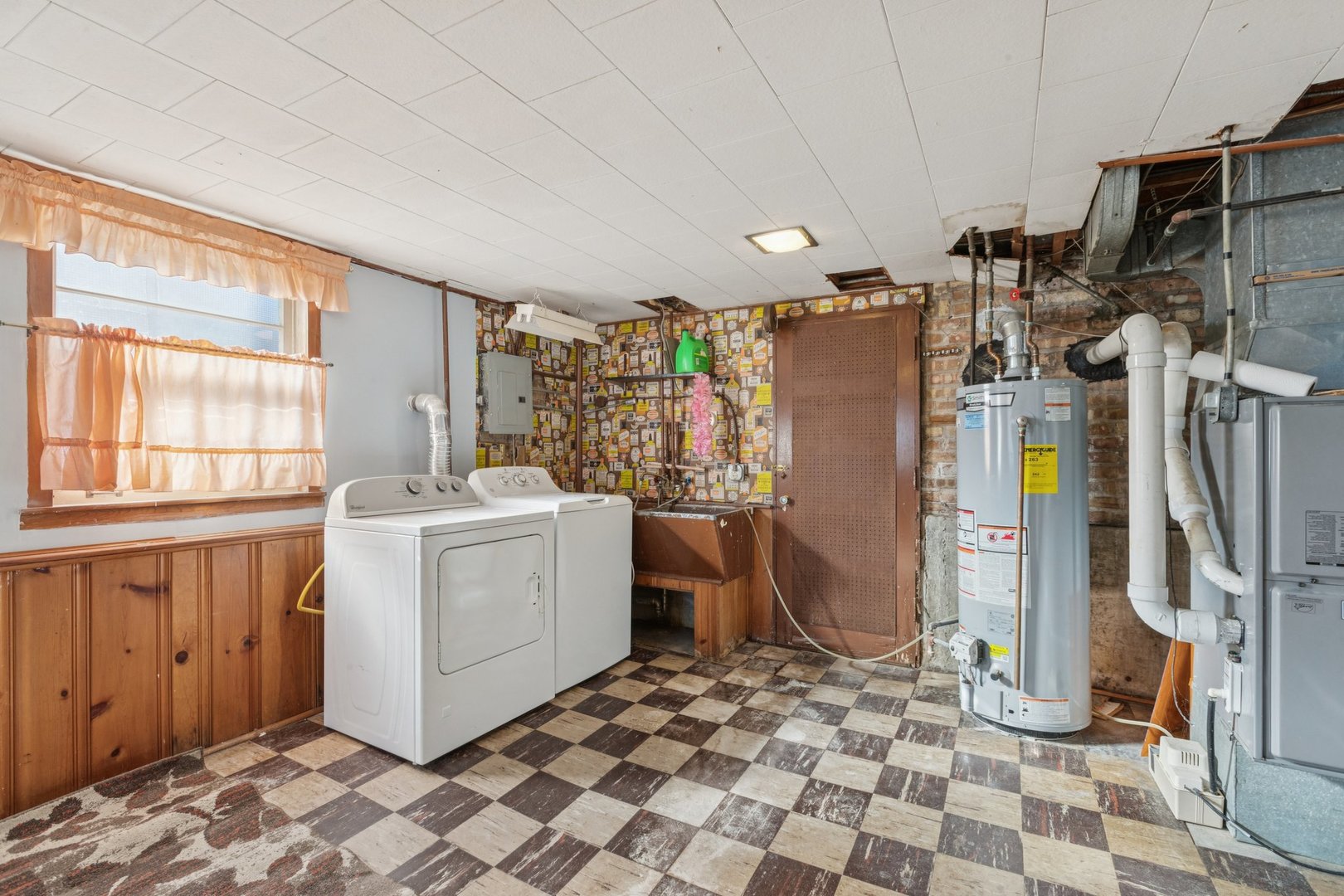 8846 Austin Avenue Morton Grove, IL 60053 - Photo 25 of 35 a room with a stove and a refrigerator
