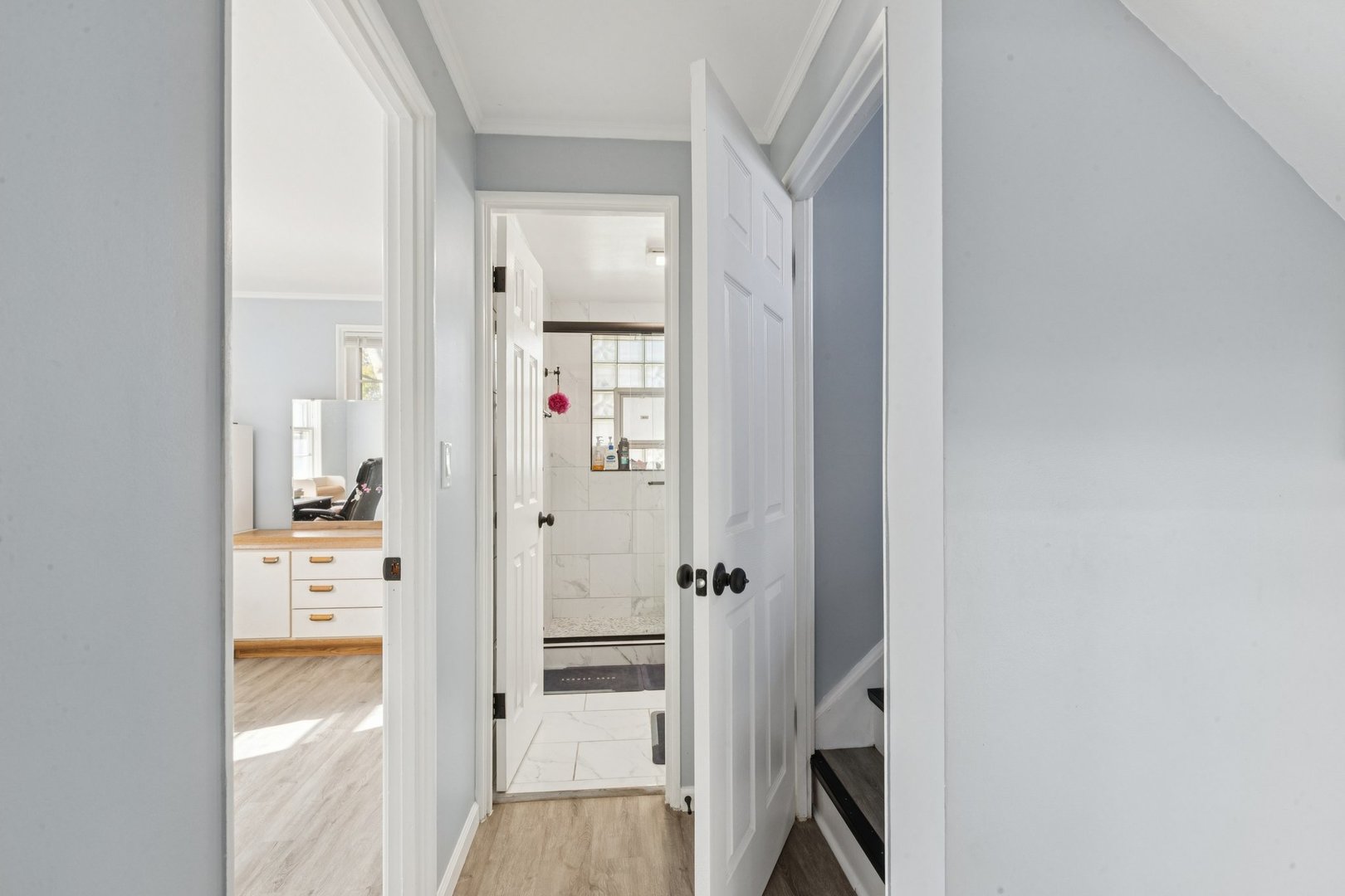 8846 Austin Avenue Morton Grove, IL 60053 - Photo 10 of 35 a bathroom with a bathtub and a shower