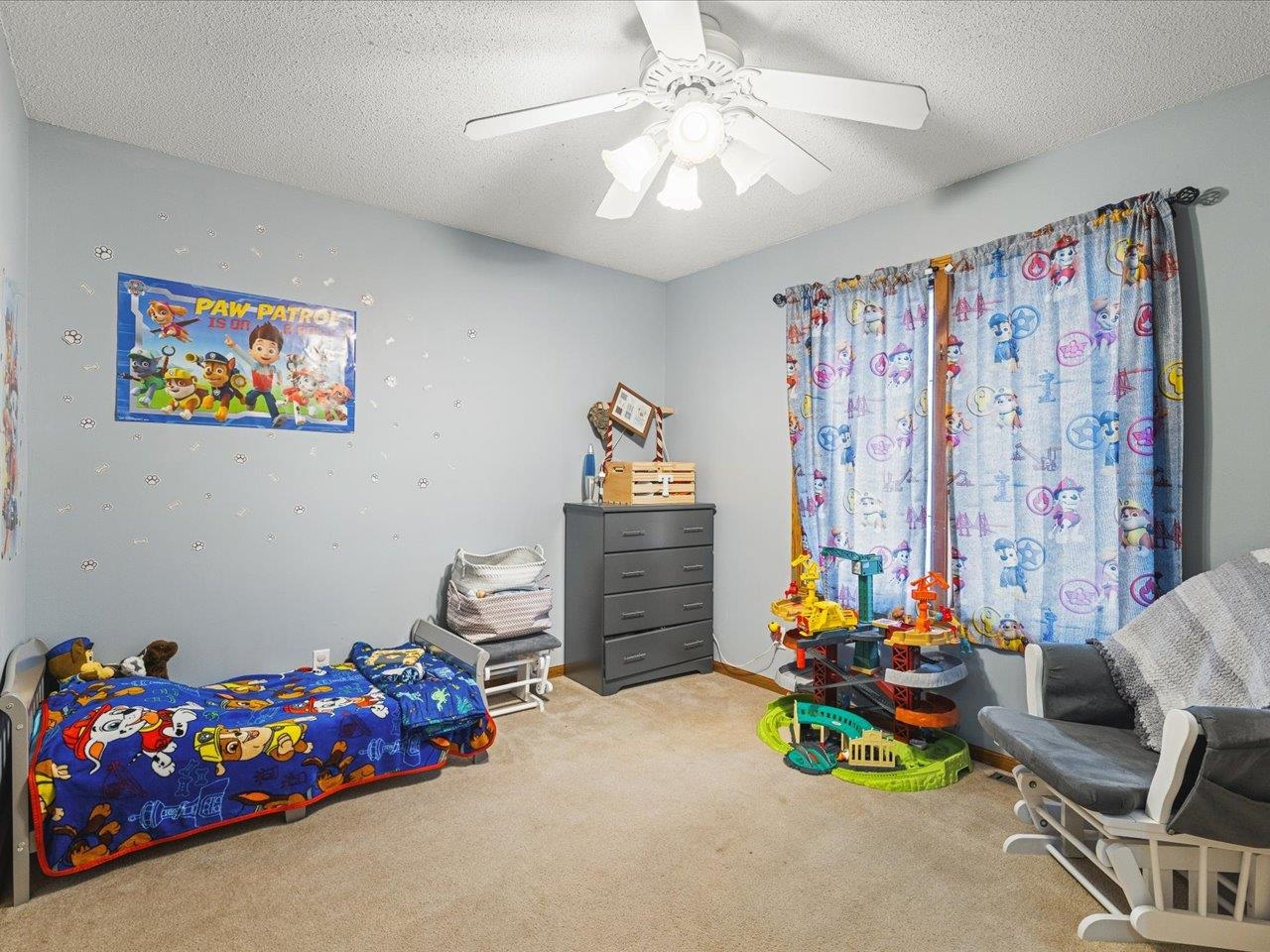 1101 Drexel Road Lake Summerset, IL 61019 - Photo 24 of 34 a living room filled with furniture and a chandelier