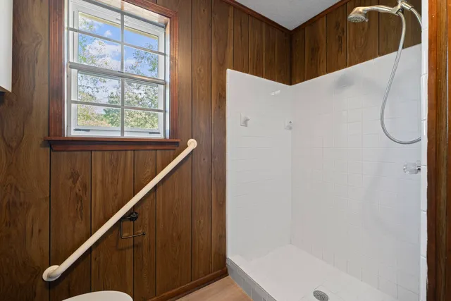 a balcony with wooden floor