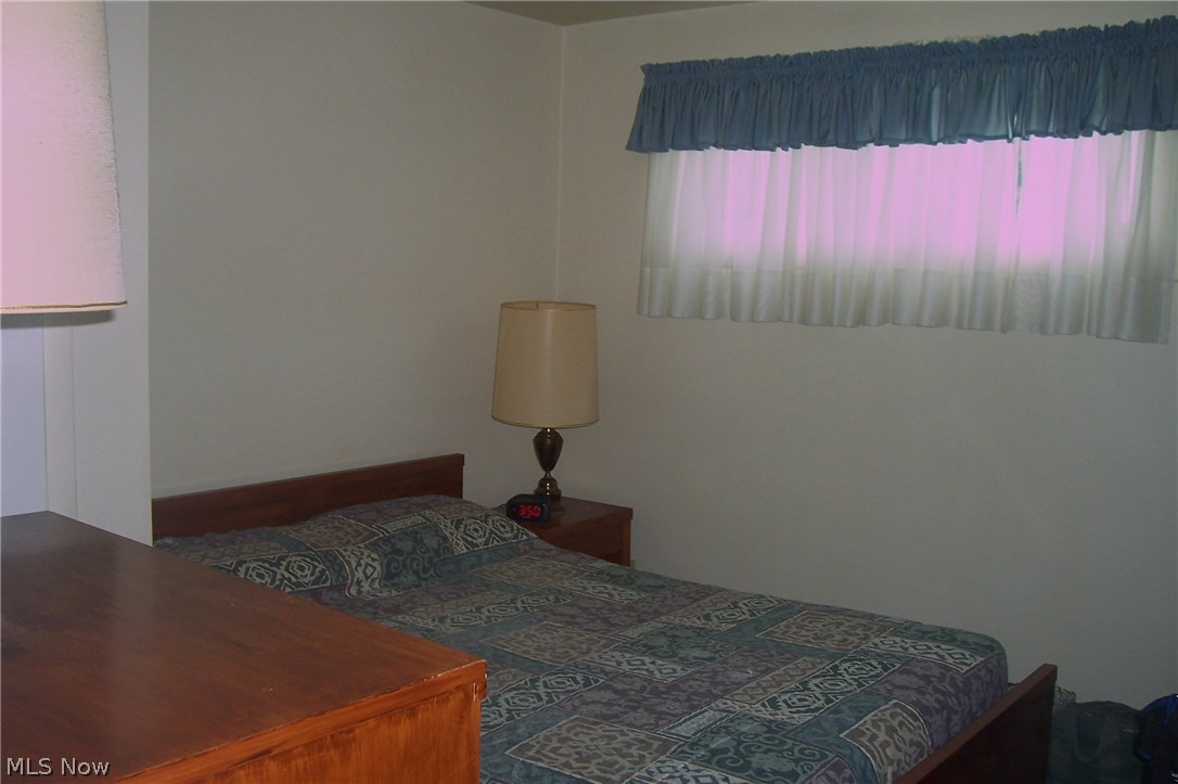 1750 Red Bird Road Madison, OH 44057 - Photo 14 of 25 One of three bedrooms.