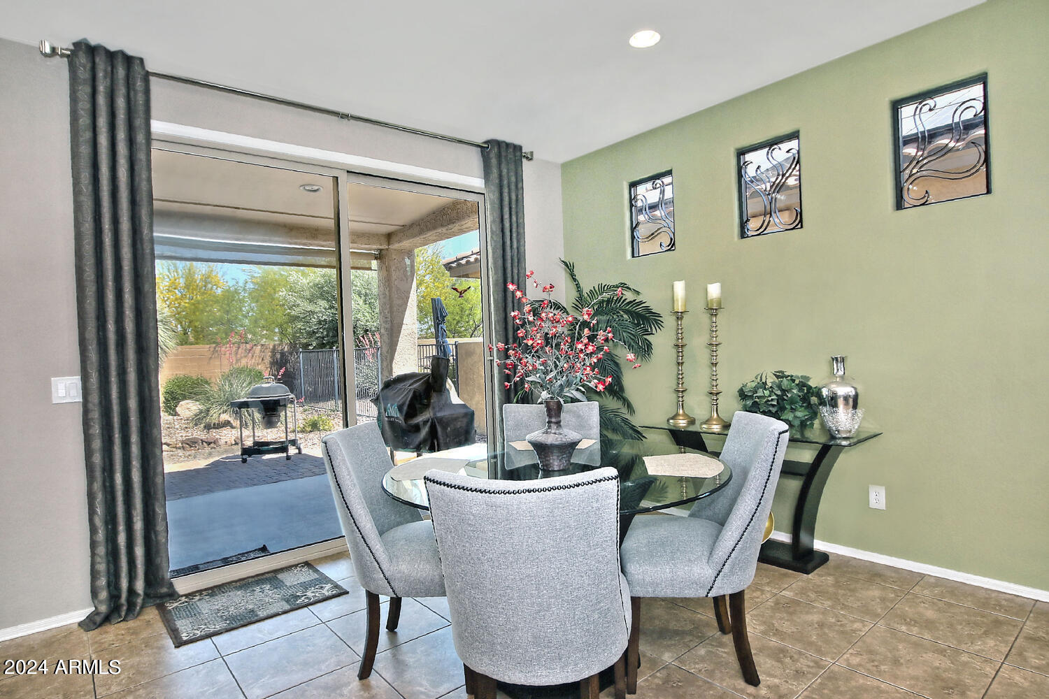 4394 North Hummingbird Drive Florence, AZ 85132 - Photo 13 of 32 a dining room with furniture and window