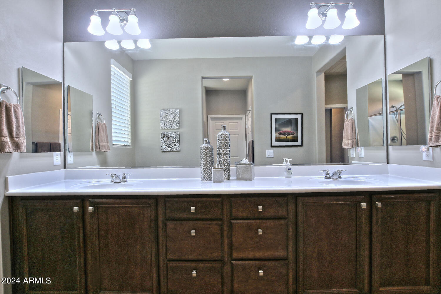 4394 North Hummingbird Drive Florence, AZ 85132 - Photo 19 of 32 a bathroom with double sink and a mirror