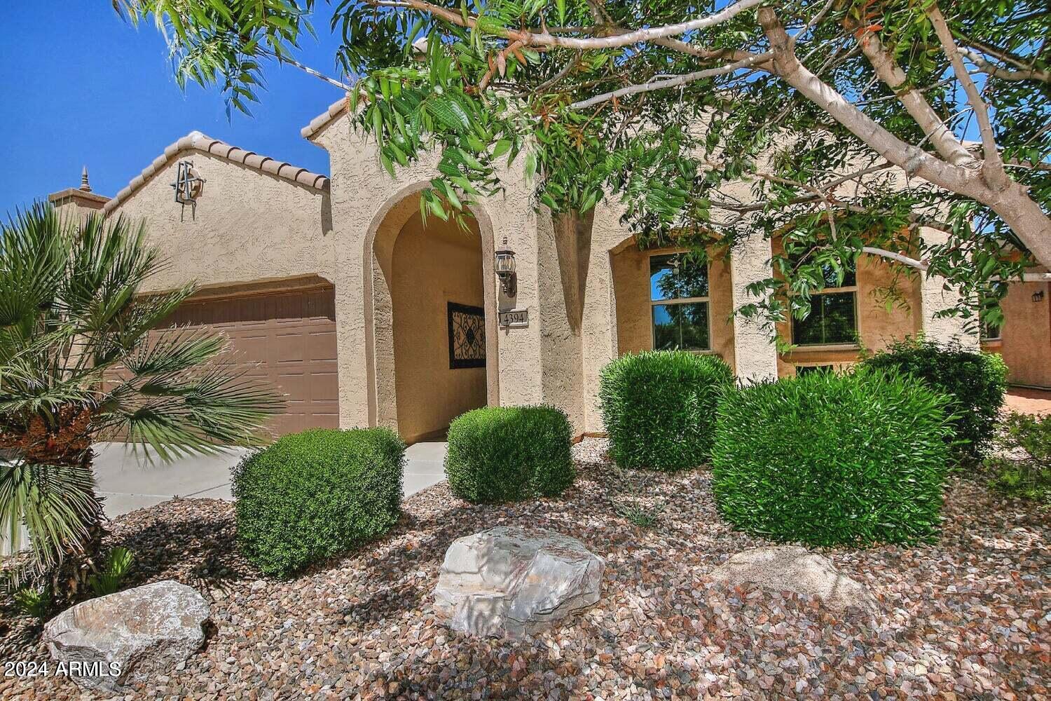 4394 North Hummingbird Drive Florence, AZ 85132 - Photo 2 of 32 a view of a house with a tree