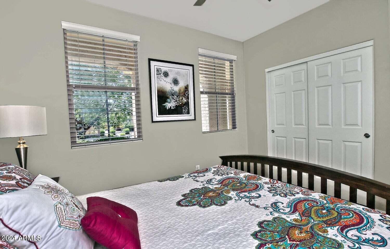 4394 North Hummingbird Drive Florence, AZ 85132 - Photo 22 of 32 a bedroom with a bed and a window