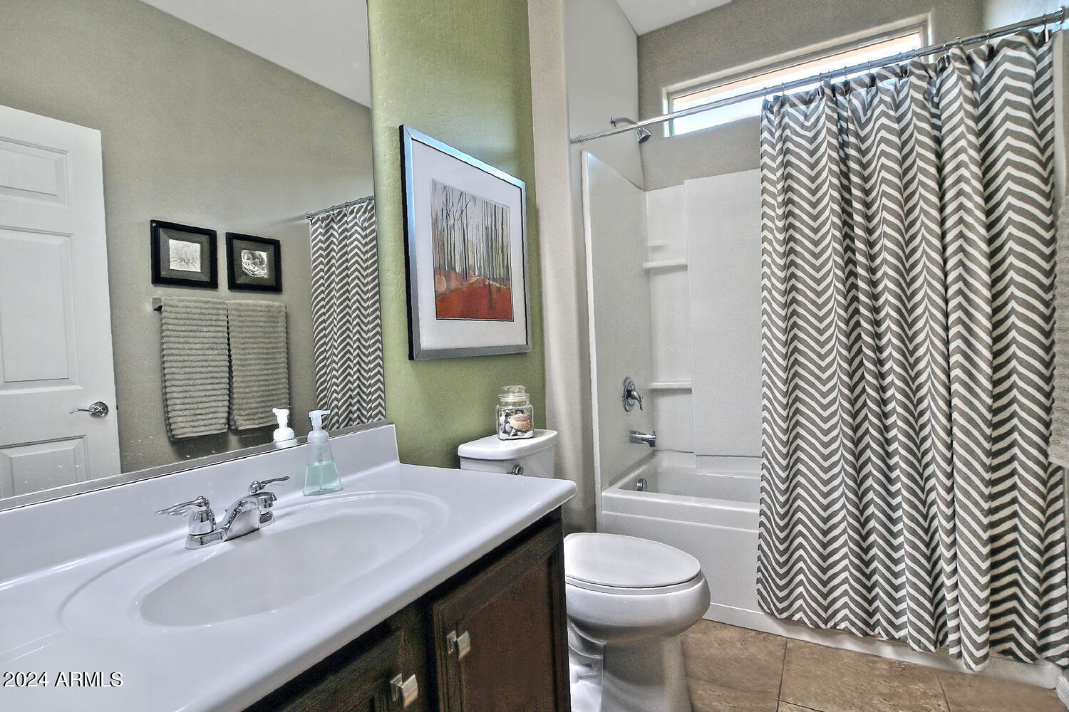 4394 North Hummingbird Drive Florence, AZ 85132 - Photo 23 of 32 a bathroom with a sink toilet and shower