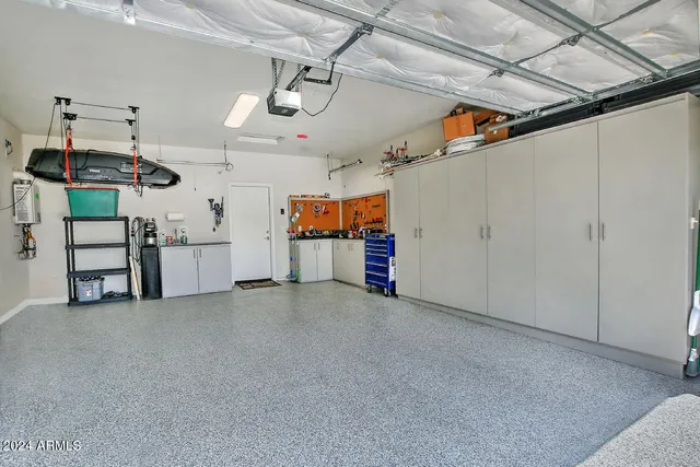 a view of a storage & utility room with a garage