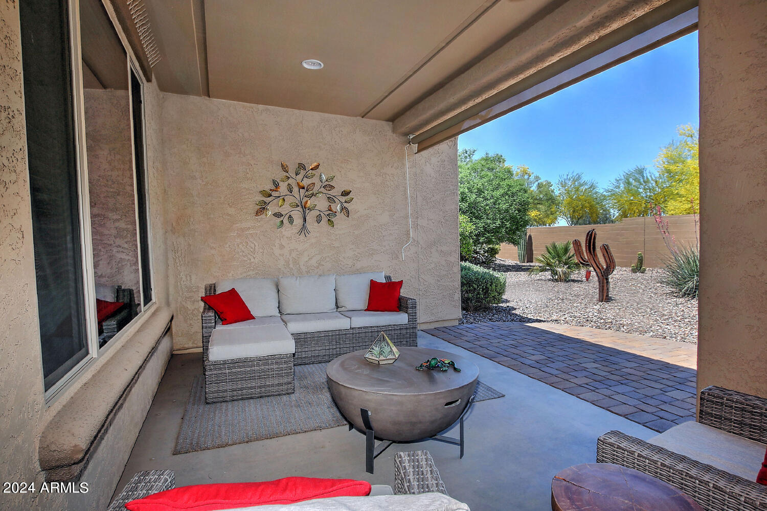 4394 North Hummingbird Drive Florence, AZ 85132 - Photo 28 of 32 a living room with couch and a large window
