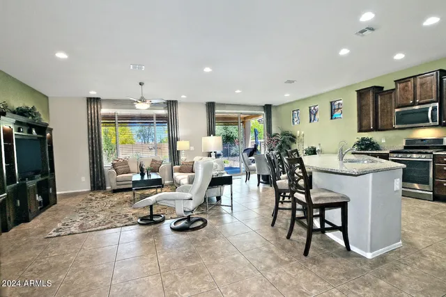 a view of a room with gym equipment and a window