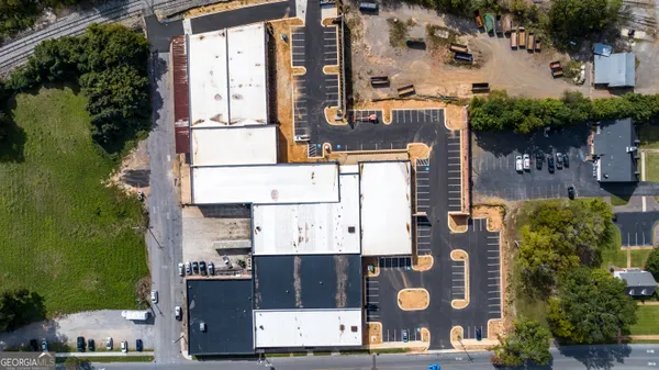 an aerial view of a house with a garden