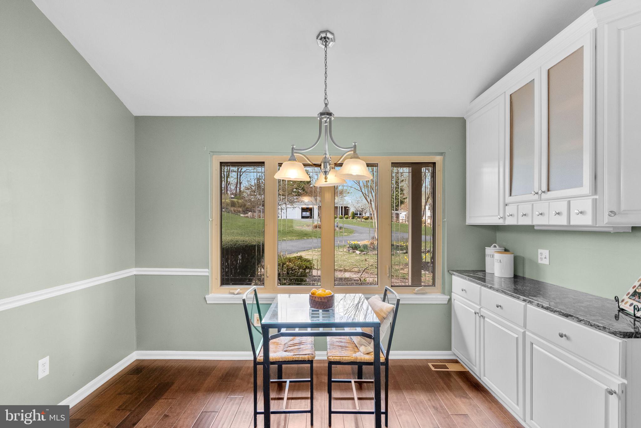 9828 Moyer Road Damascus, MD 20872 - Photo 19 of 46 a dining room with furniture and window
