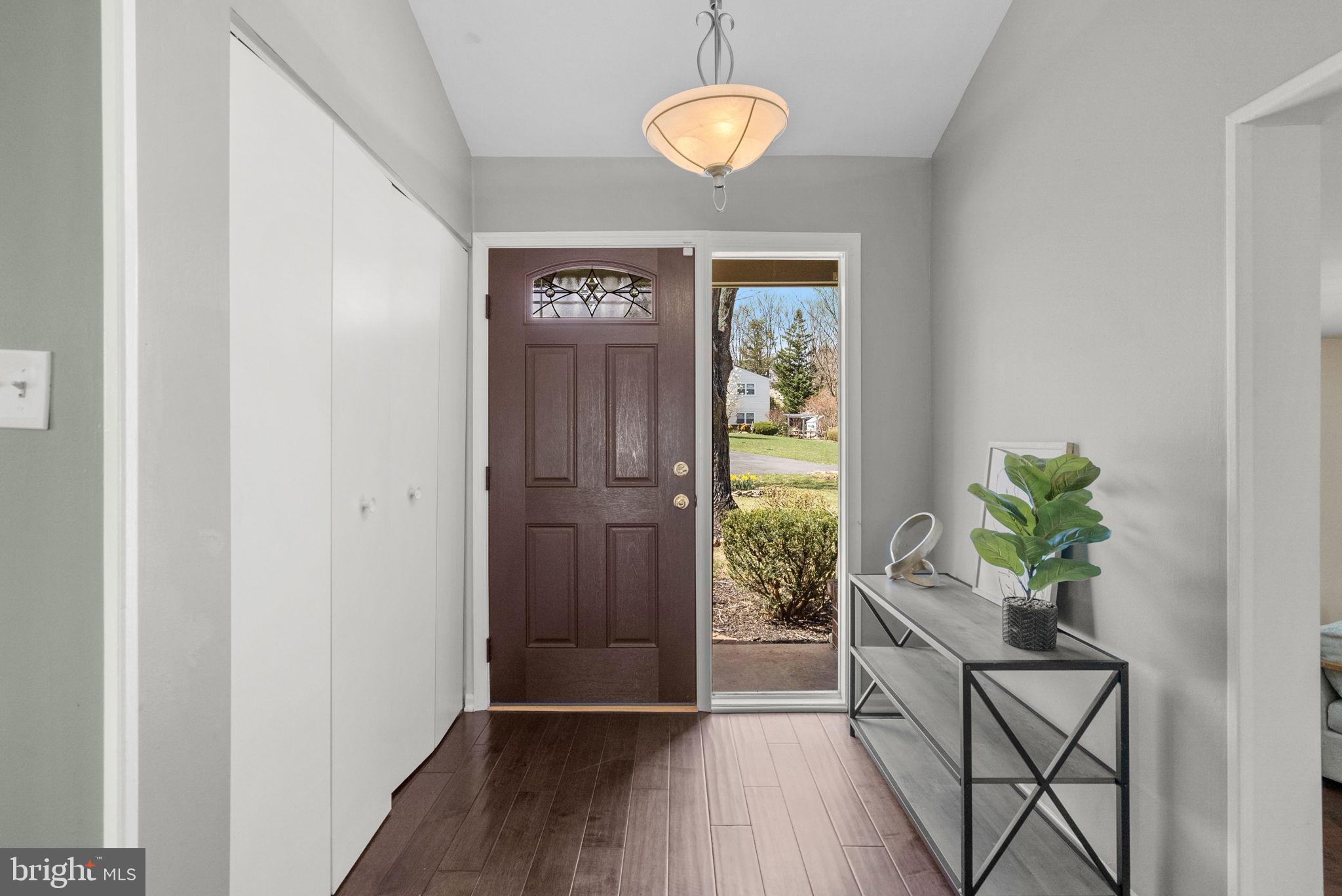 9828 Moyer Road Damascus, MD 20872 - Photo 3 of 46 a view of an entryway with wooden floor
