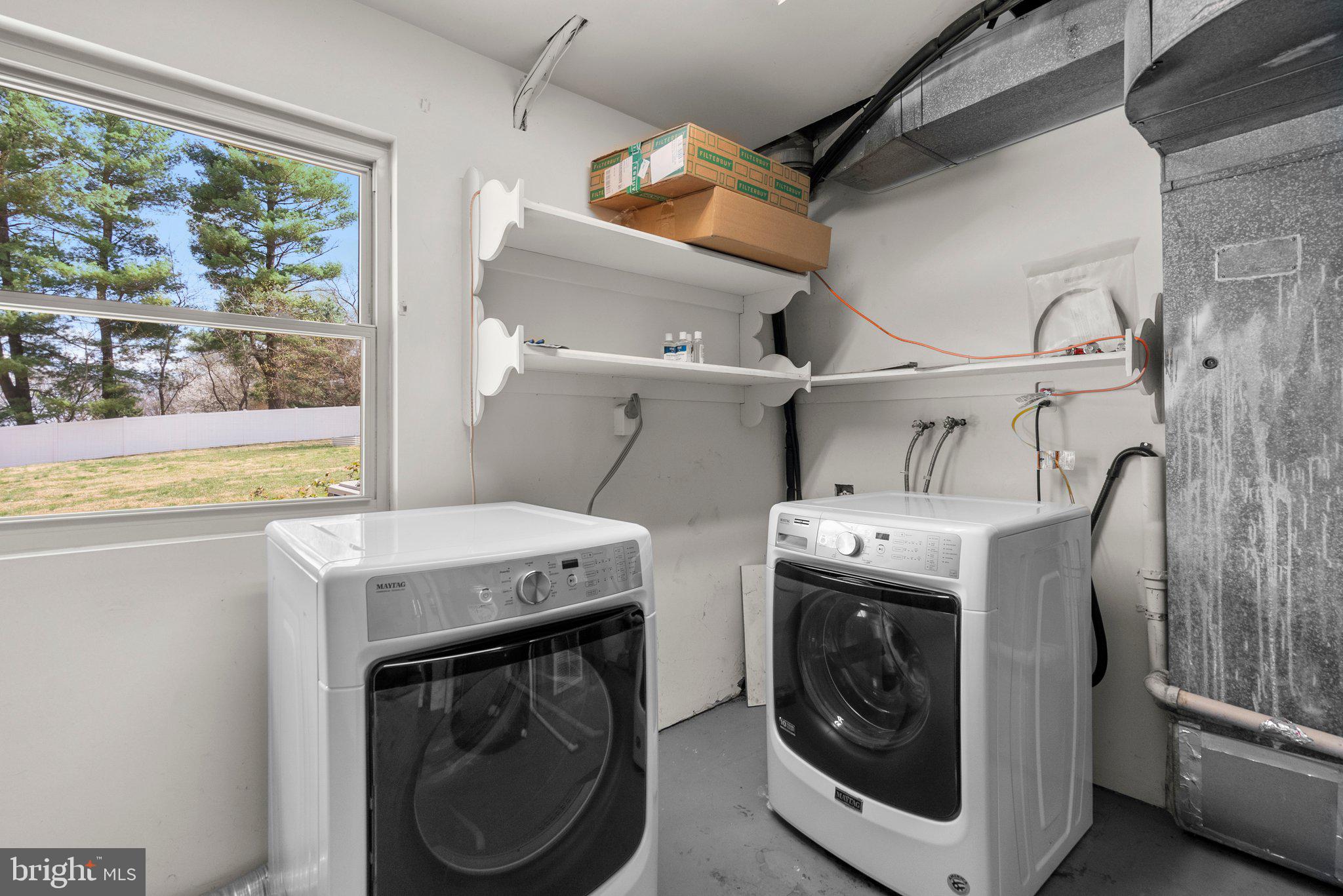 9828 Moyer Road Damascus, MD 20872 - Photo 37 of 46 a utility room with dryer and washer