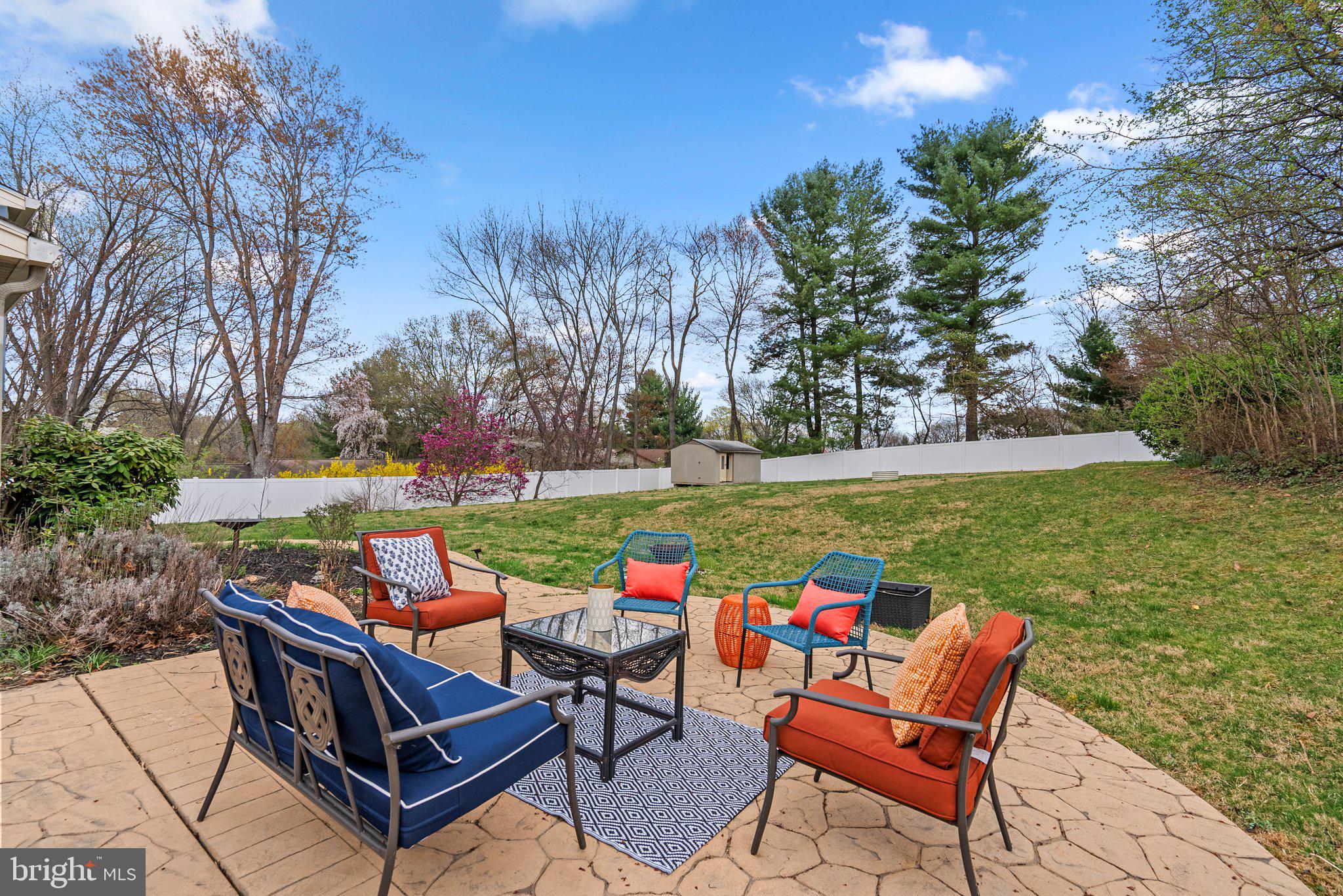 9828 Moyer Road Damascus, MD 20872 - Photo 40 of 46 a view of a chairs and table in the garden