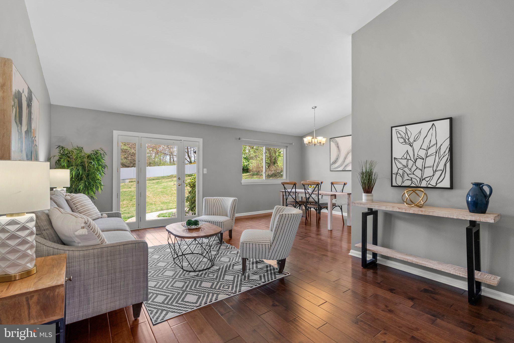 9828 Moyer Road Damascus, MD 20872 - Photo 4 of 46 a living room with furniture and wooden floor