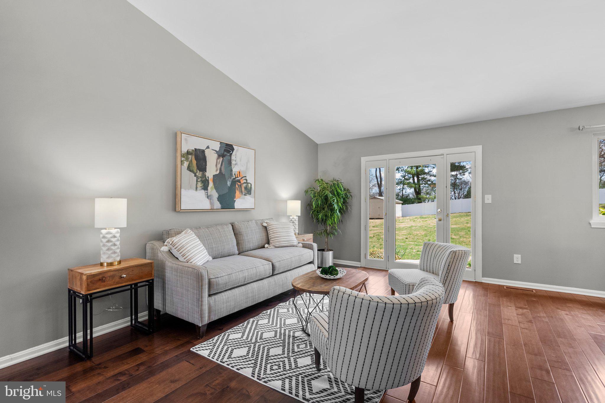 9828 Moyer Road Damascus, MD 20872 - Photo 5 of 46 a living room with furniture and a window