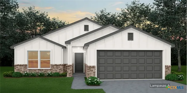 a view of a backyard of the house